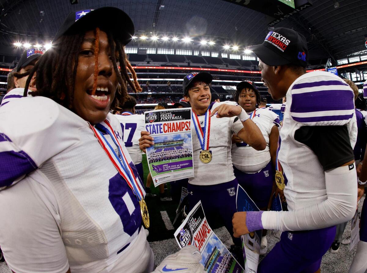Anna running back Edward Chumloy and game offensive MVP celebrates with team mates after winning the UIL Conference 4A Division 1 state championship football game at AT&T Stadium in Arlington, Texas, Thursday, Dec. 14, 2023.