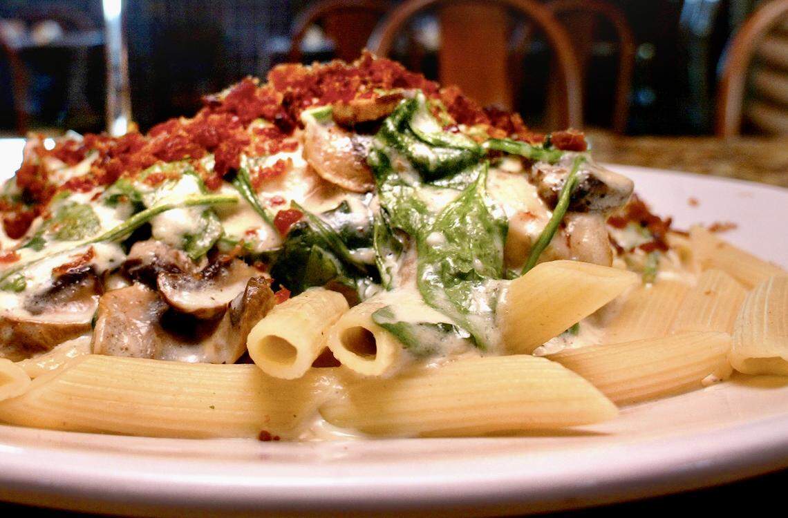 “Heavenly” chicken is topped with bacon, spinach and mushroom Alfredo over penne, as seen Feb. 27, 2008.