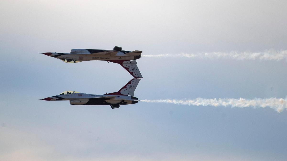 A pair of U.S. Air Force Thunderbirds perform a Calypso pass during the AllianceTexas Aviation Expo presented by Bell at the Fort Worth Alliance Airport in Fort Worth on Saturday, Oct. 22, 2022.