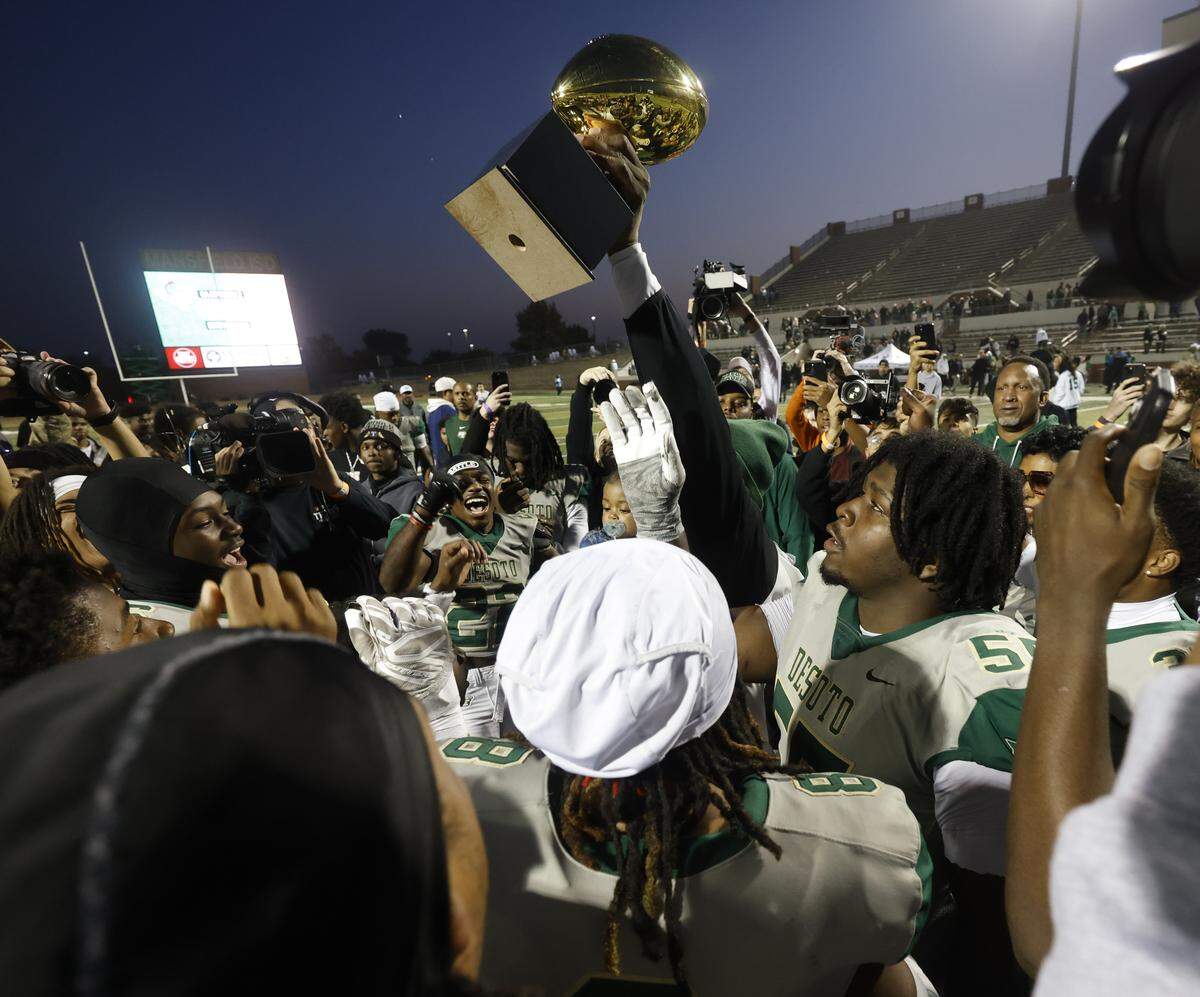 The DeSoto Eagles celebrate winning a UIL Class 6A Division II semifinal after defeating Southlake Carroll on Saturday Dec. 13, 2025 at Vernon Newsom Stadium in Mansfield, Texas.