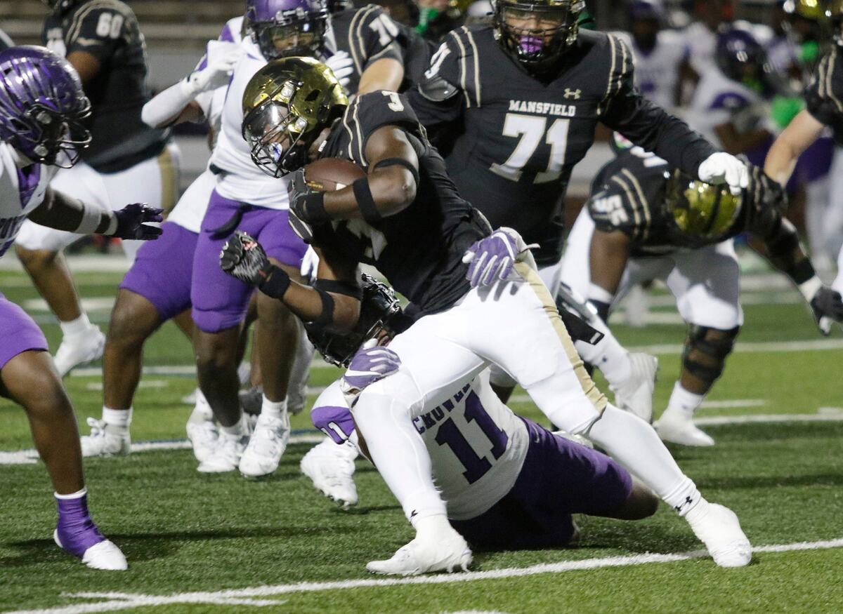 Mansfield’s Teddy Clark is brought down for no gain during a UIL football game at Newsome Stadium on Saturday , October 10, 2024.