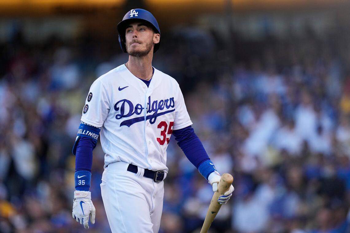 Los Angeles Dodgers’ Cody Bellinger walks off the field after striking out during the sixth inning against the Atlanta Braves in Game 3 of baseball’s National League Championship Series Tuesday, Oct. 19, 2021, in Los Angeles. (AP Photo/Jae Hong)