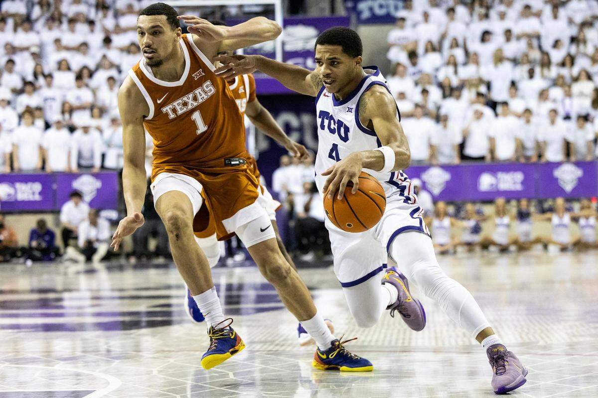 TCU guard Jameer Nelson Jr. (4) drives to the basket in the second half agaisnt the Texas Longhorns at Schollmaier Arena on Saturday, Feb. 3, 2024.