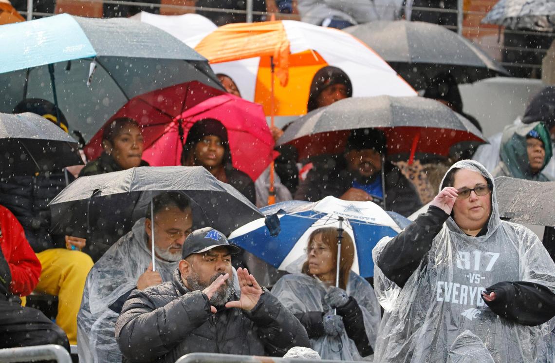 Panther fans endure the rain during the UIL 6A D1 Quarterfinals at Vernon Newsom Stadium in Mansfield, Texas, Saturday, Dec. 07, 2024.