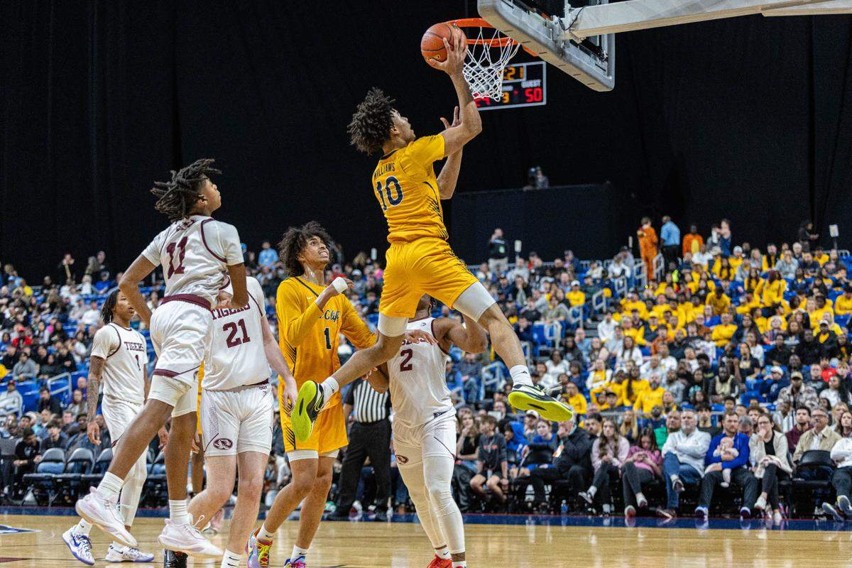 Oak Cliff Faith Family senior guard Isaac Williams makes a layup in the Class 4A state championship game on Saturday, March 9, 2024 at the Alamodome in San Antonio, Texas. Faith Family defeated Silsbee 80-66.