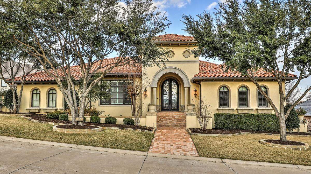 The home at 6808 Sawgrass Drive has been custom designed to bring the outdoors in with many expansive windows.