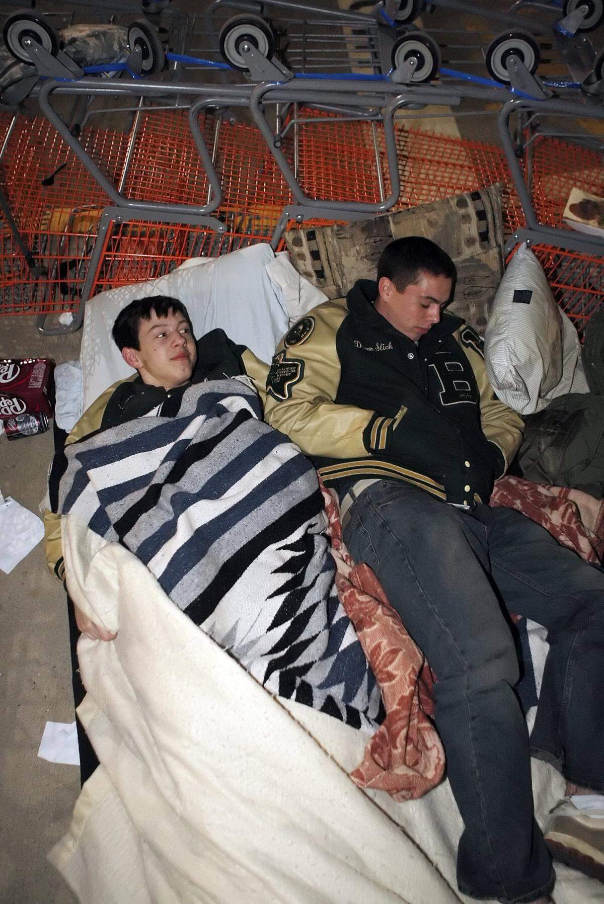 2009: Dylan Slick, 16, and Daren Slick, 18, brought blankets and cots to stay warm and comfortable while waiting in line to buy laptops and TVs at Best Buy near Northeast Mall in Hurst. The brothers said that they’ve waited inline for Black Friday deals for the past five years. “It’s not so much about the deals, it’s just hanging out,” Daren said.