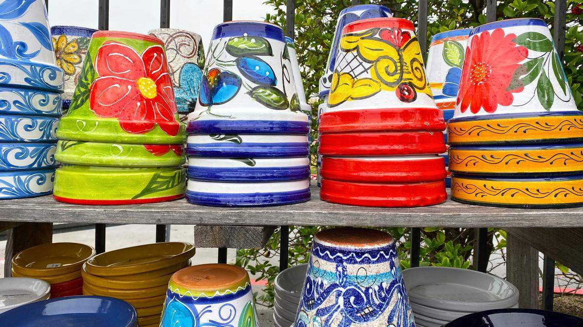 There is currently a wide assortment of glazed ceramic pots available in nurseries, which can help give your landscape some pop.