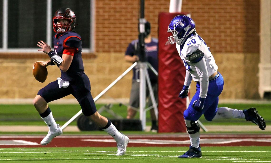 Northwest quarterback Jake Strong (4) tries to scrambles past Brewer defensive lineman Robert Fick (50) during the first half of a high school football game, November 19, 2020 played at Northwest ISD Stadium in Justin, Tx. (Steve Nurenberg Special to the Star-Telegram)
