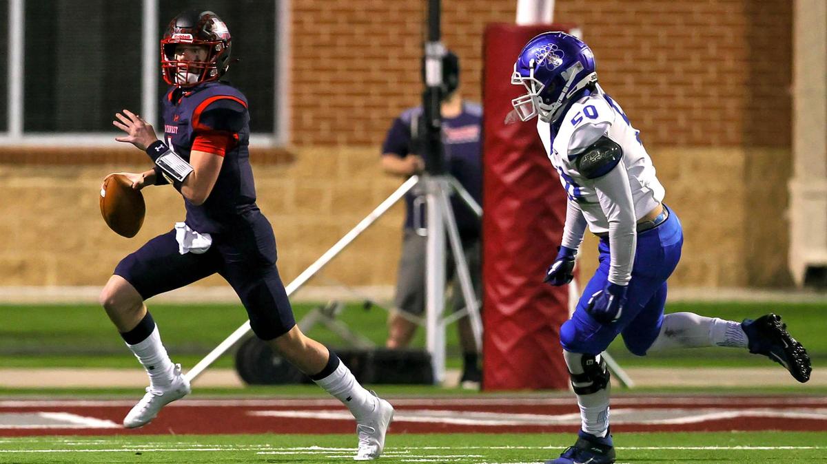 Northwest quarterback Jake Strong (4) tries to scrambles past Brewer defensive lineman Robert Fick (50) during the first half of a high school football game, November 19, 2020 played at Northwest ISD Stadium in Justin, Tx. (Steve Nurenberg Special to the Star-Telegram)
