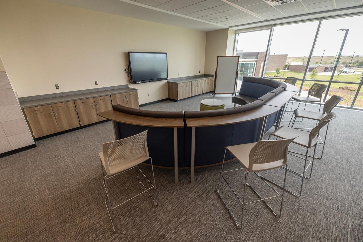 Collaboration spaces in between classrooms allow students to work together on projects and presentations.