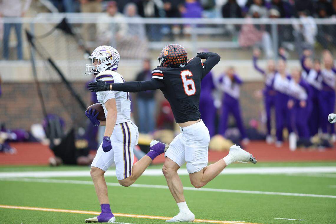 Alvarado receiver Paijton Fox makes a long reception as Springtown safety Riley Jackson makes the tackle during a Class 4A Division I regional semifinal Friday, Nov. 28, 2025, at Knight Stadium at Eagle Mountain High School in Fort Worth.