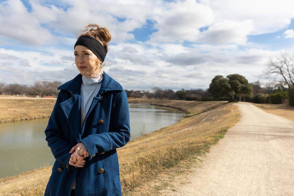 Jesca Arnold walks over to where she was attacked by a naked man in 2017 along the Trinity Trails in Fort Worth. Arnold has started the nonprofit Safe and Happy Trails and is talking to city leaders to facilitate the installation of emergency call posts along trails and in parks.