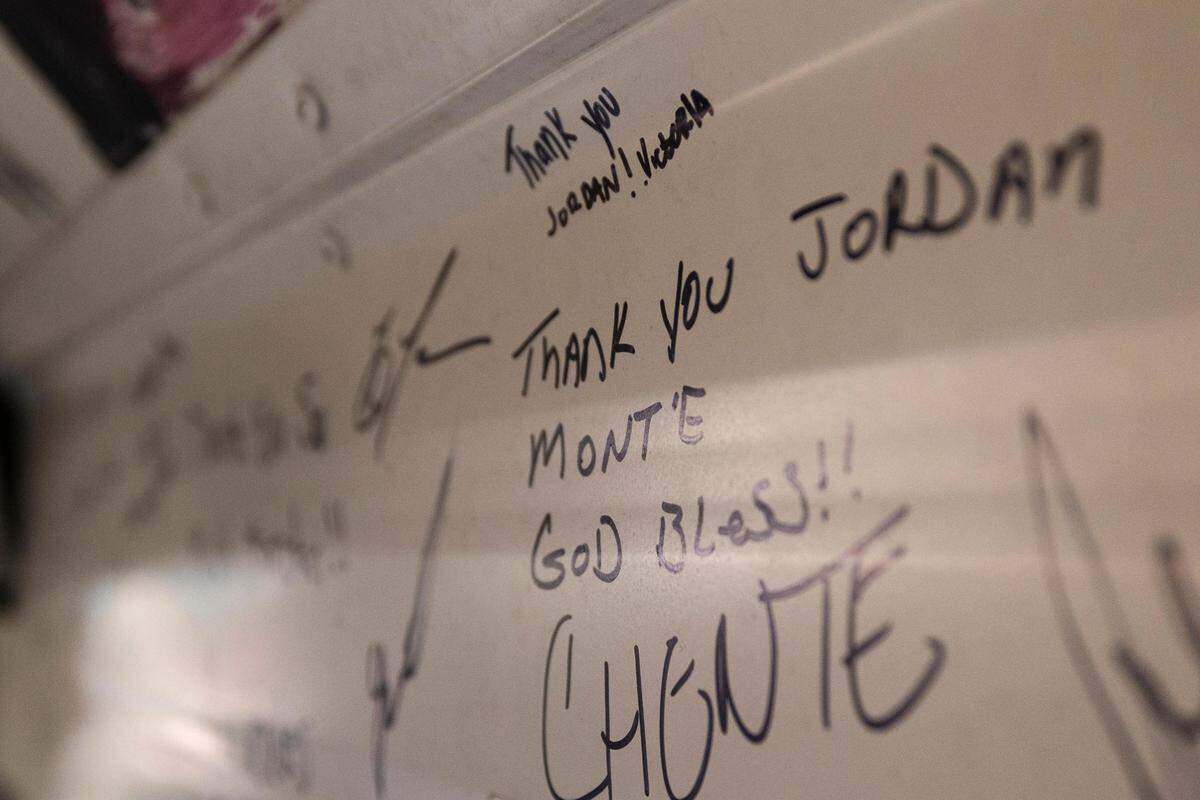 People left notes for the CleanUP crew on a bus converted to a barbershop Tuesday, Aug. 9, 2022, in Fort Worth. CleanUP hosts events throughout the area to offer free haircuts and clothing.