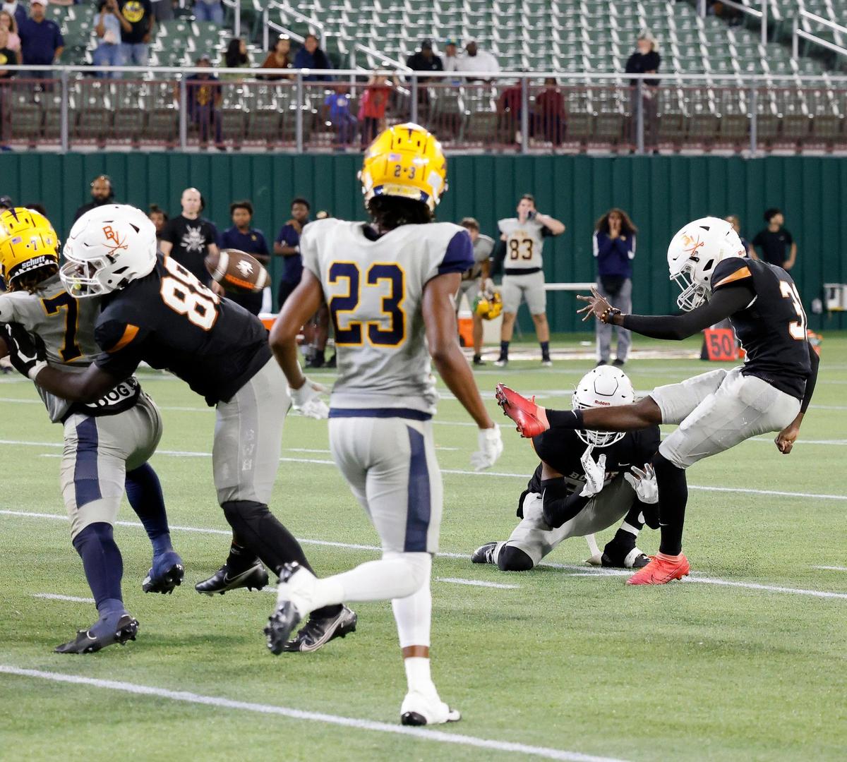 Bowie kicker Nate Acheampong (31) kicks the game winning field goal in the second half of a UIL high football game at Choctaw Stadium in Arlington, Texas, Thursday, Oct. 26, 2023. Bowie defeated Lamar 31-29. With the win Bowie clinched their playoff berth. (Special to the Star-Telegram Bob Booth)