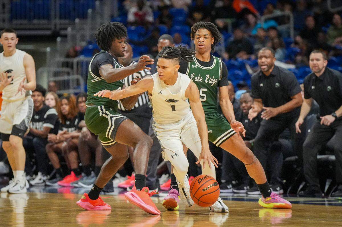 Plano East’s Rachard Angton tries to dribble out of a trap against Mansfield Lake Ridge in a Class 6A state semifinal on Friday, March 8, 2024 at the Alamodome in San Antonio, Texas. Plano East downed Lake Ridge 61-45.