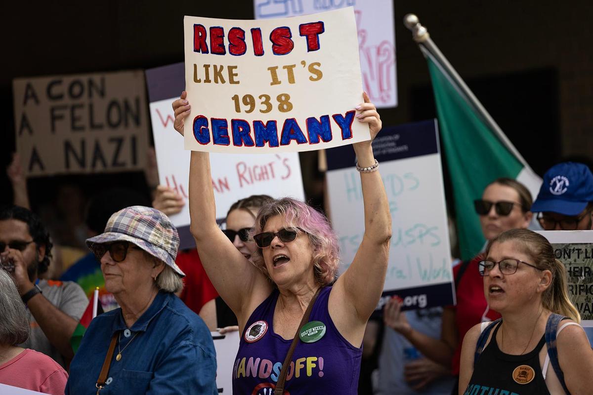 Protesters gather for the Fort Worth May Day 2025 Rally in Solidarity With Federal Workers at the old City Hall building in downtown Fort Worth on Thursday, May 1, 2025.