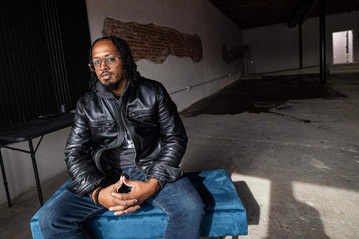 Dante Williams, the owner of Blank Space Fort Worth, is photographed in one of the rooms in the Blank Space building on the city’s east side. Williams said his mission is to celebrate Black and brown artists, photographers and creatives by providing a space to showcase their work and host events.