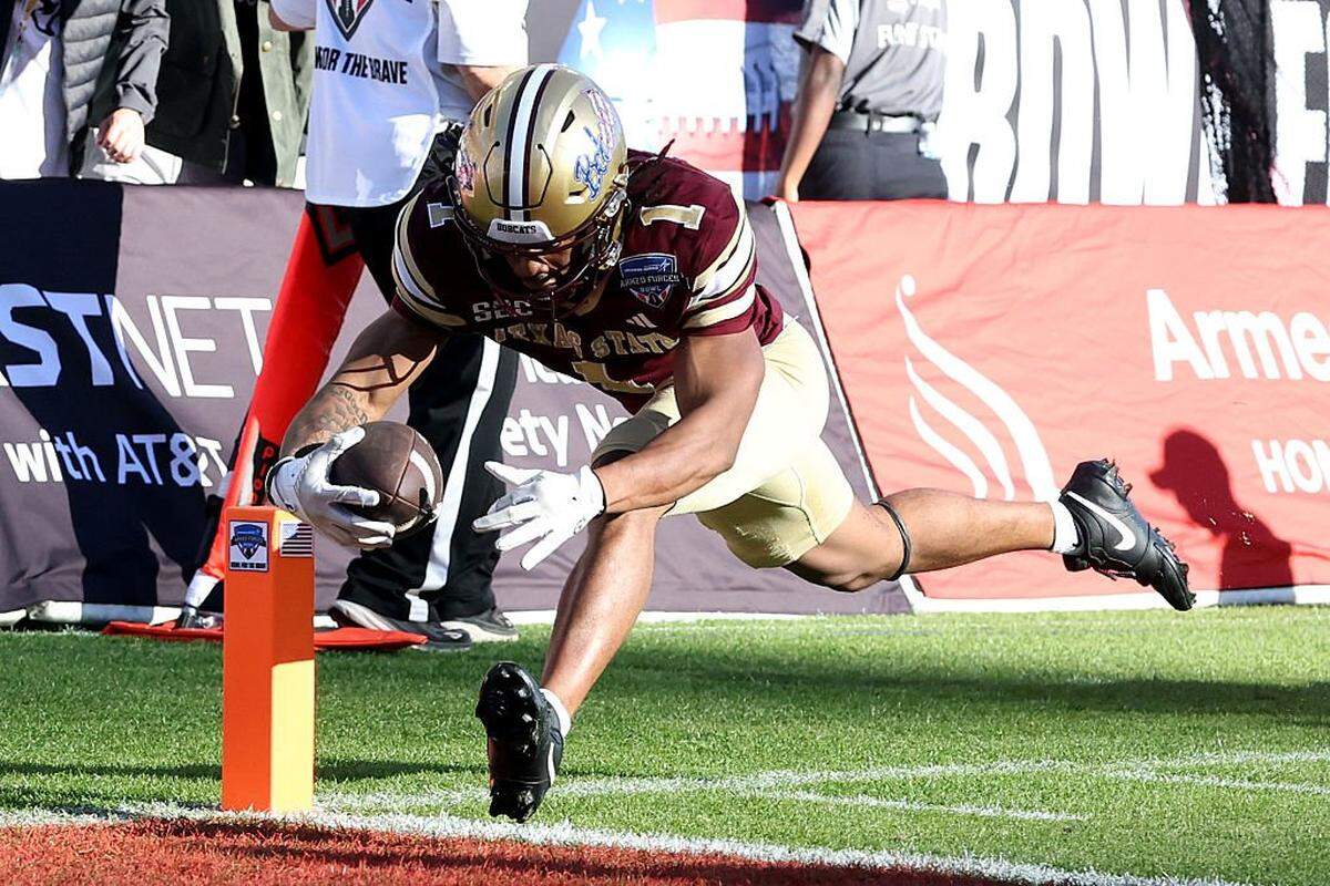 FORT WORTH, TEXAS - JANUARY 02: Chris Dawn Jr. #1 of the Texas State Bobcats scores a touchdown against the Rice Owls during the second half of the 2026 Lockheed Martin Armed Forces Bowl at Amon G. Carter Stadium on January 02, 2026 in Fort Worth, Texas. (Photo by Tim Heitman/Getty Images)