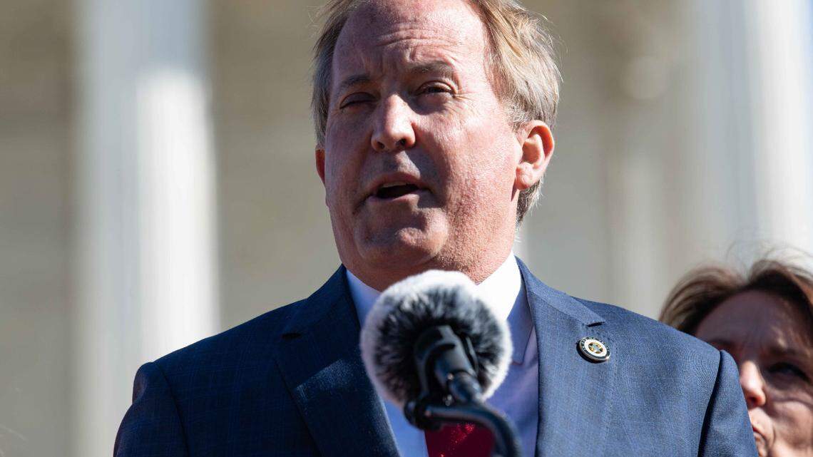 Nov 1, 2021; Washington, DC, USA; Texas Attorney General Ken Paxton speaks in front of the Supreme Court after arguing before the justices in favor of SB-8, the controversial Texas abortion law limiting procedures to the first six weeks of pregnancy, and empowering citizens to enforce the law against one another. Mandatory Credit: Hannah Gaber-USA TODAY