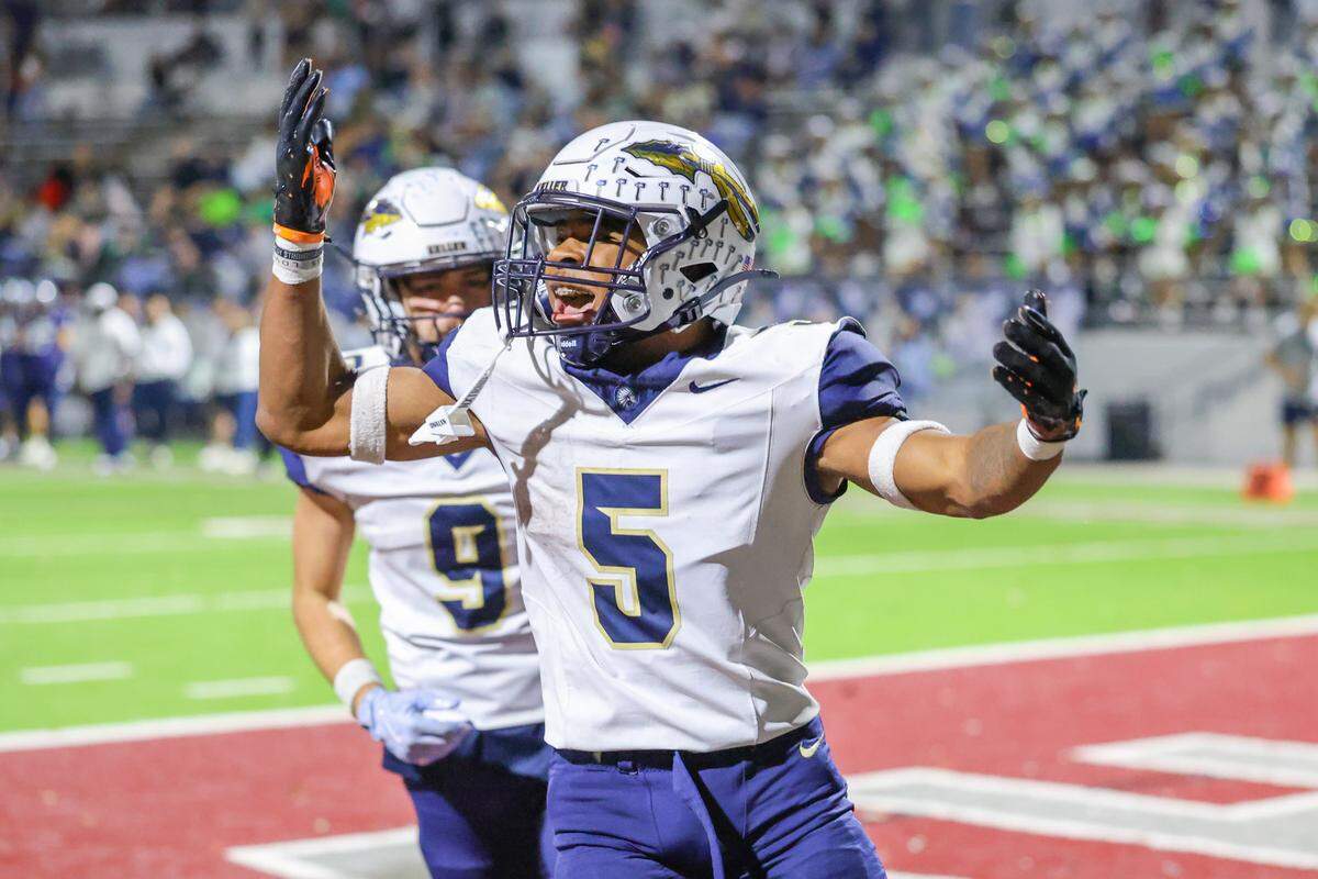 Keller’s Quintin Shropshire celebrates his 4-yard TD run with 1:03 left in the game to give the Indians a 48-45 victory over Eaton at Northwest ISD Stadium in Justin, Texas, Friday, Nov. 7, 2025.