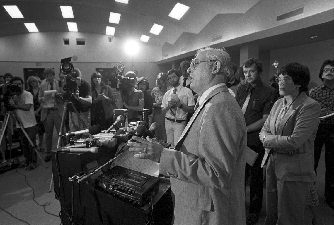 Oct. 4, 1981: Dr. Vincent DiMaio talks to reporters in Dallas following an autopsy of Lee Harvey Oswald after the remains were exhumed from Rose Hill Memorial Park in Fort Worth. Dr. Linda Norton, who headed the autopsy team, is seen standing behind DiMaio. The autopsy took place at the Baylor University Medical Center.