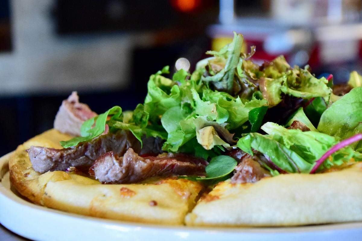A steak-blue cheese pizza at Funky Picnic Brewery & Cafe.