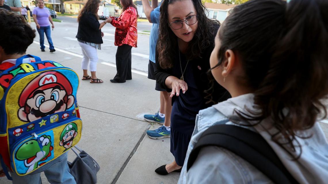 Fort Worth ISD Superintendent Angélica M. Ramsey greets students at M.H. Moore Elementary School for the first day of school on Aug. 13.