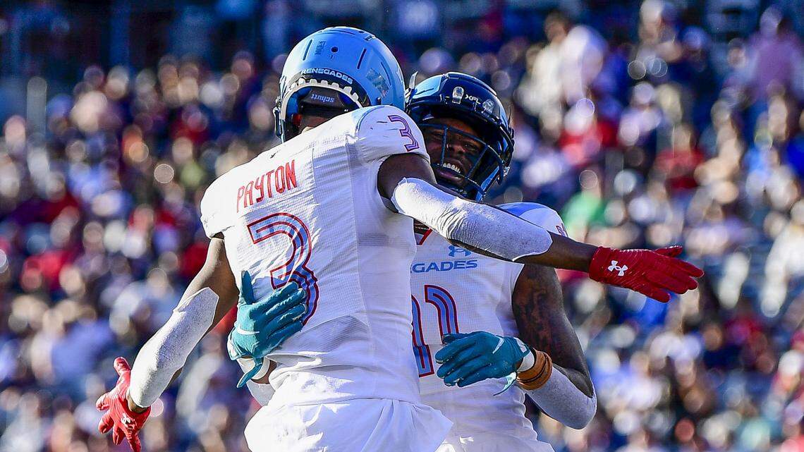 JaVonta Payton celebrates scoring a touchdown with a teammate in the Arlington Renegades’ win over the Houston Roughnecks on Saturday.