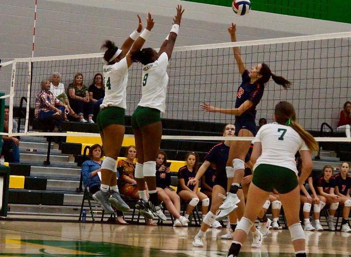 Lebanon Trail Jr Rayna Williams, left, and Jr Ashia Dorsey go for a block