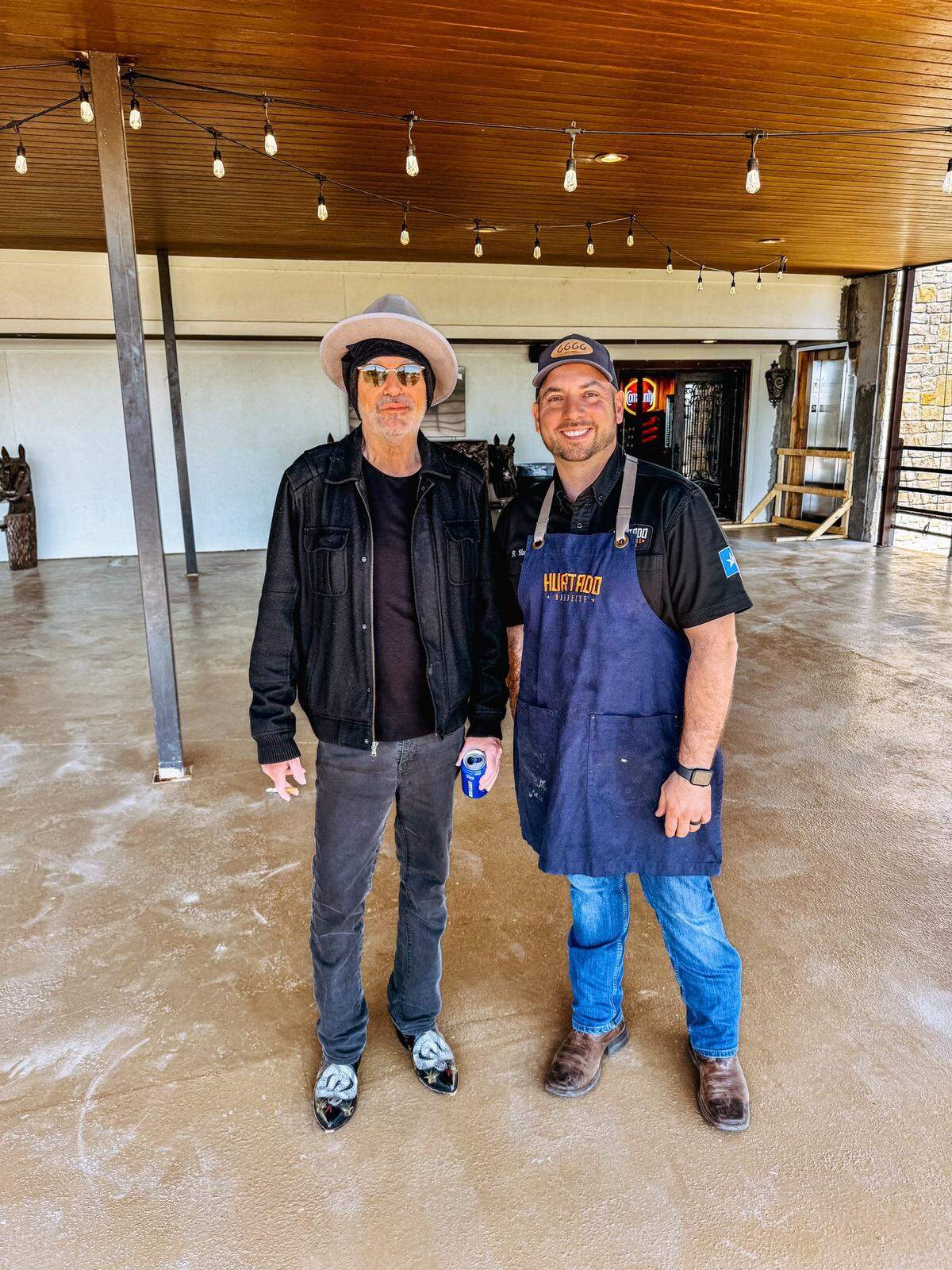 Billy Bob Thornton takes a photo with Hurtado Barbecue owner Brandon Hurtado.