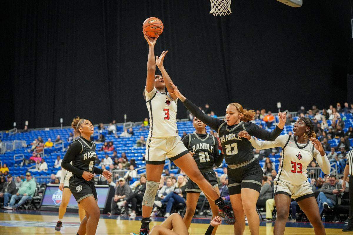 Frisco Liberty’s Jacy Abii goes up for two of her game-high 17 points against Richmond Randle in a Class 5A state semifinal on Thursday, February 29, 2024 at the Alamodome in San Antonio, Texas. Liberty defeated Randle 66-37.