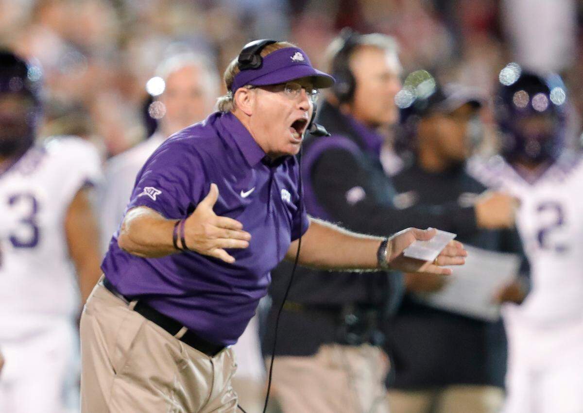 TCU head coach Gary Patterson yells to his team before a play against Oklahoma during the first half of an NCAA college football game, Saturday, Oct. 16, 2021, in Norman, Okla. (AP Photo/Alonzo Adams)