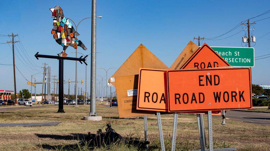 Public art lowers over North Beach Street in far north Fort Worth. The city is considering a monthly fee to pay for street maintenance.
