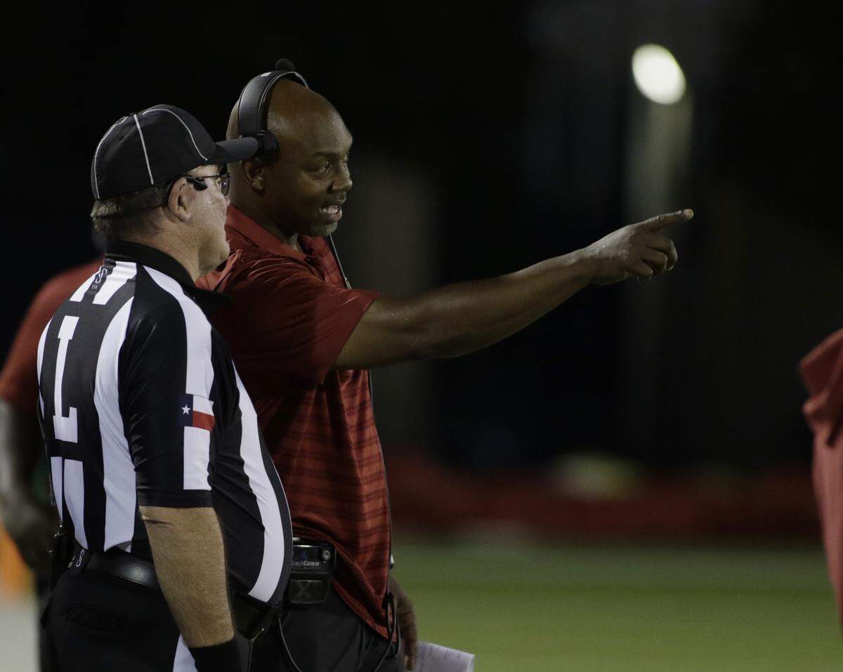 Keller Central head coach Eric Vance talks with a referee during their game against Keller at Keller ISD Athletic Complex on Friday, Sep. 26, 2025.