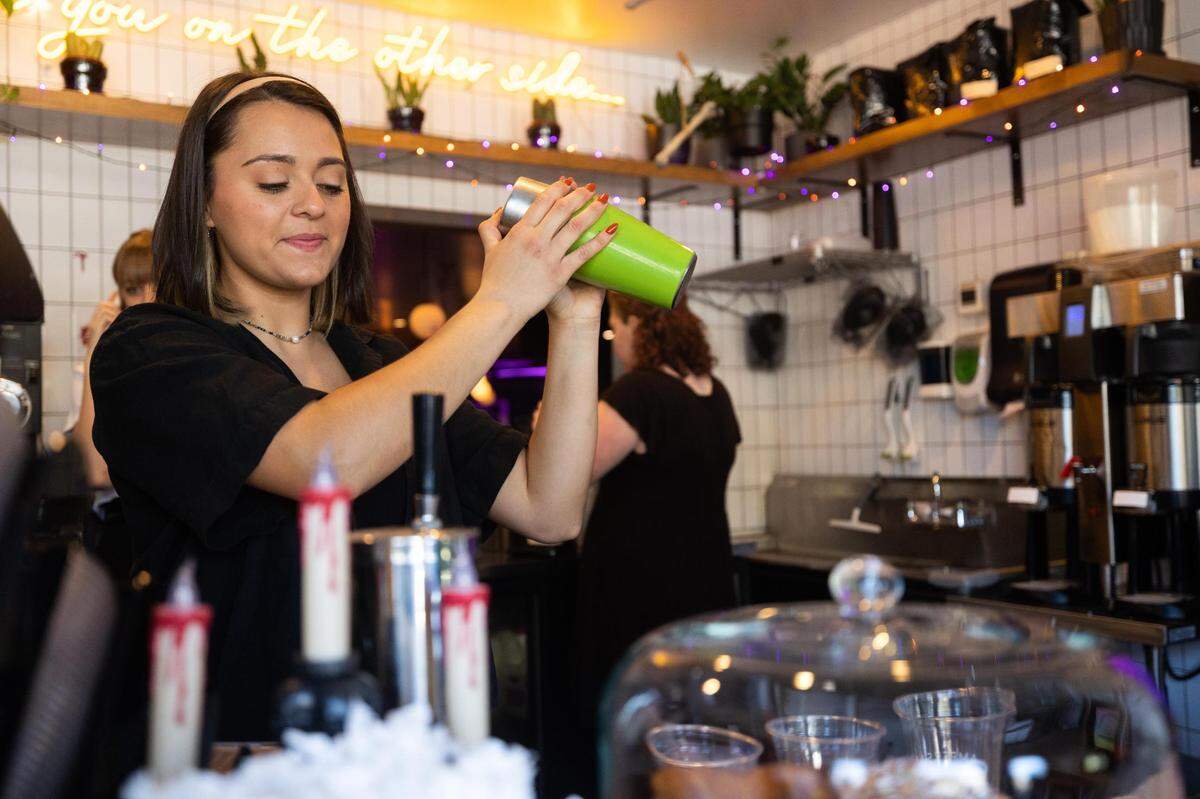 Jamie Dominguez makes an espresso drink at Ampersand.