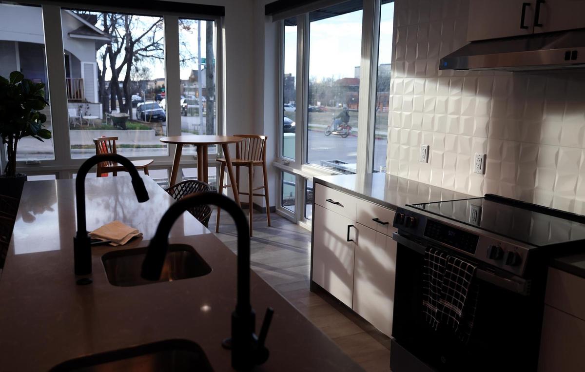 The first floor shared kitchen at Bryan Flats in the Near Southside neighborhood of Fort Worth on Thursday, Jan. 30, 2025.