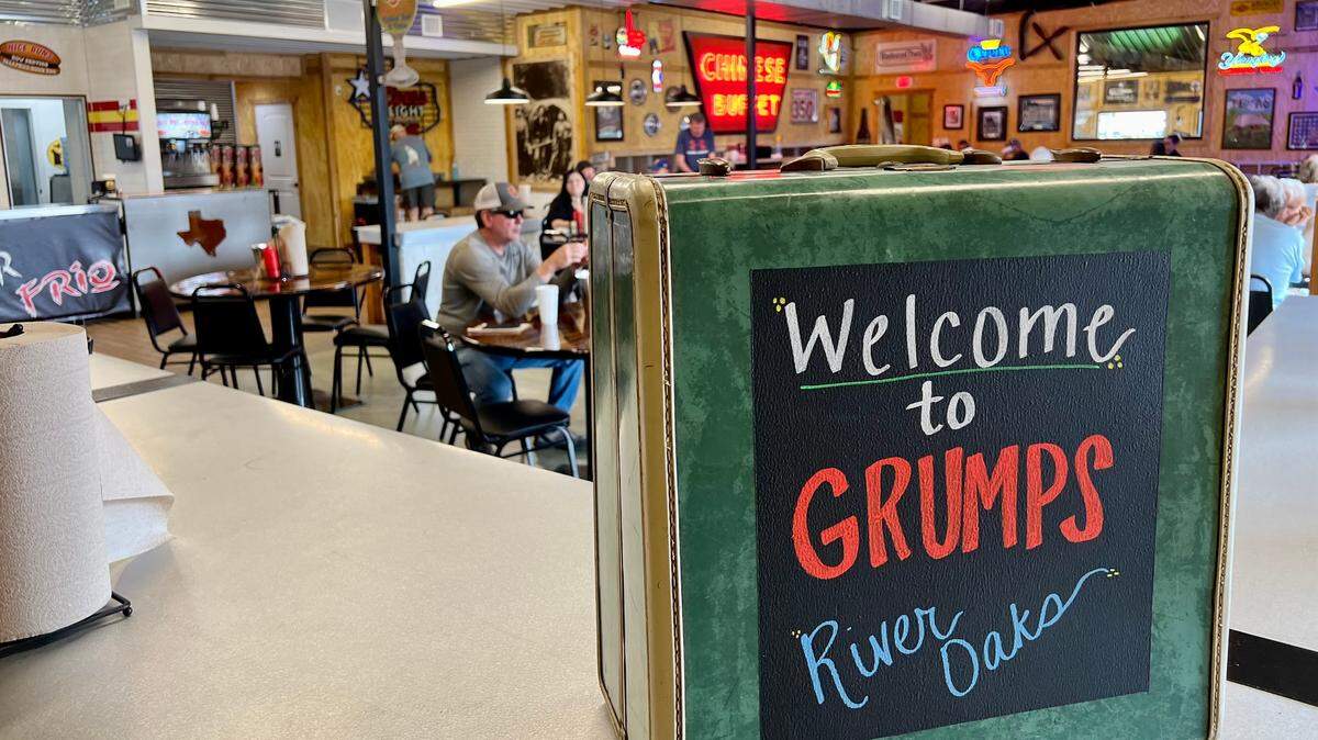 The Grumps Burgers in River Oaks includes photos and neon signs from old bars and restaurants.