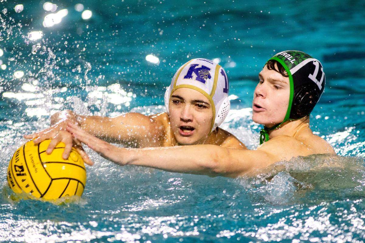 Keller’s Jet Reyero and Southlake’s Brandt McBride battle for the ball on Friday, Sept. 9. 2022, at the Carroll ISD Aquatics Center in Southlake, Texas.