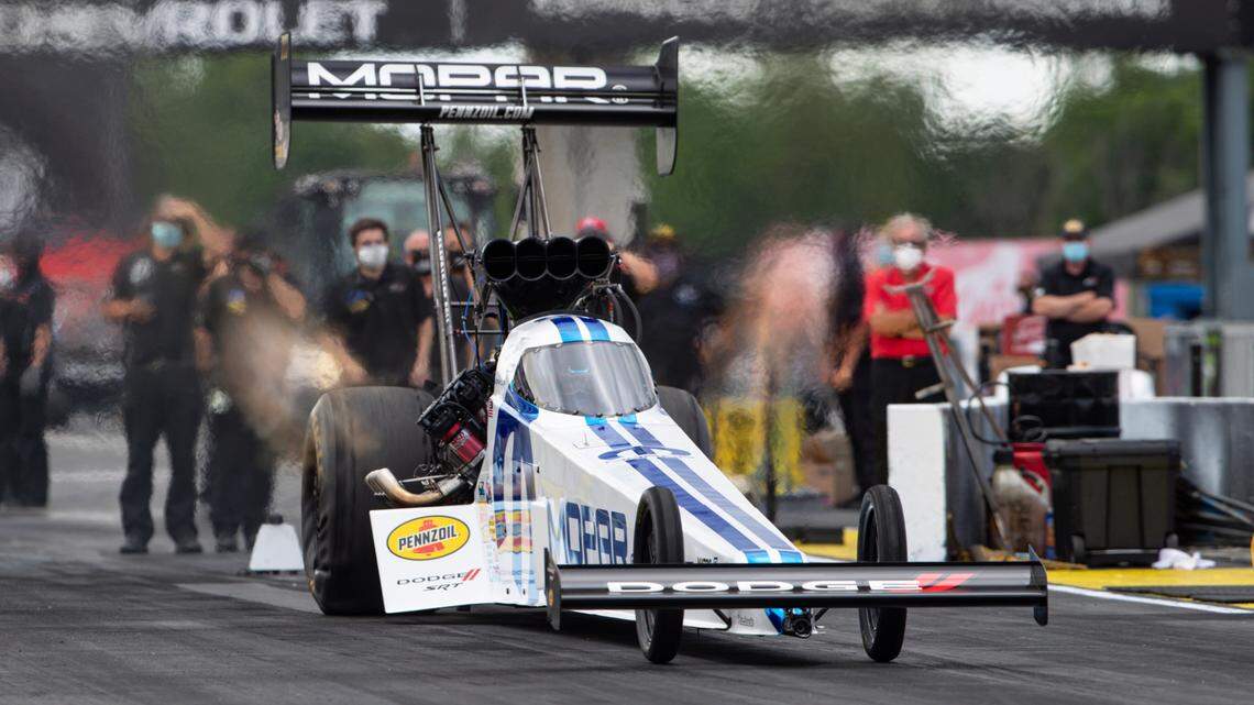 Leah Pritchett, now Leah Pruett, drives a Top Fuel dragster from the starting line on a practice run for an NHRA drag racing event in Brownsburg, Ind., in this Friday, July 10, 2020, file photo.