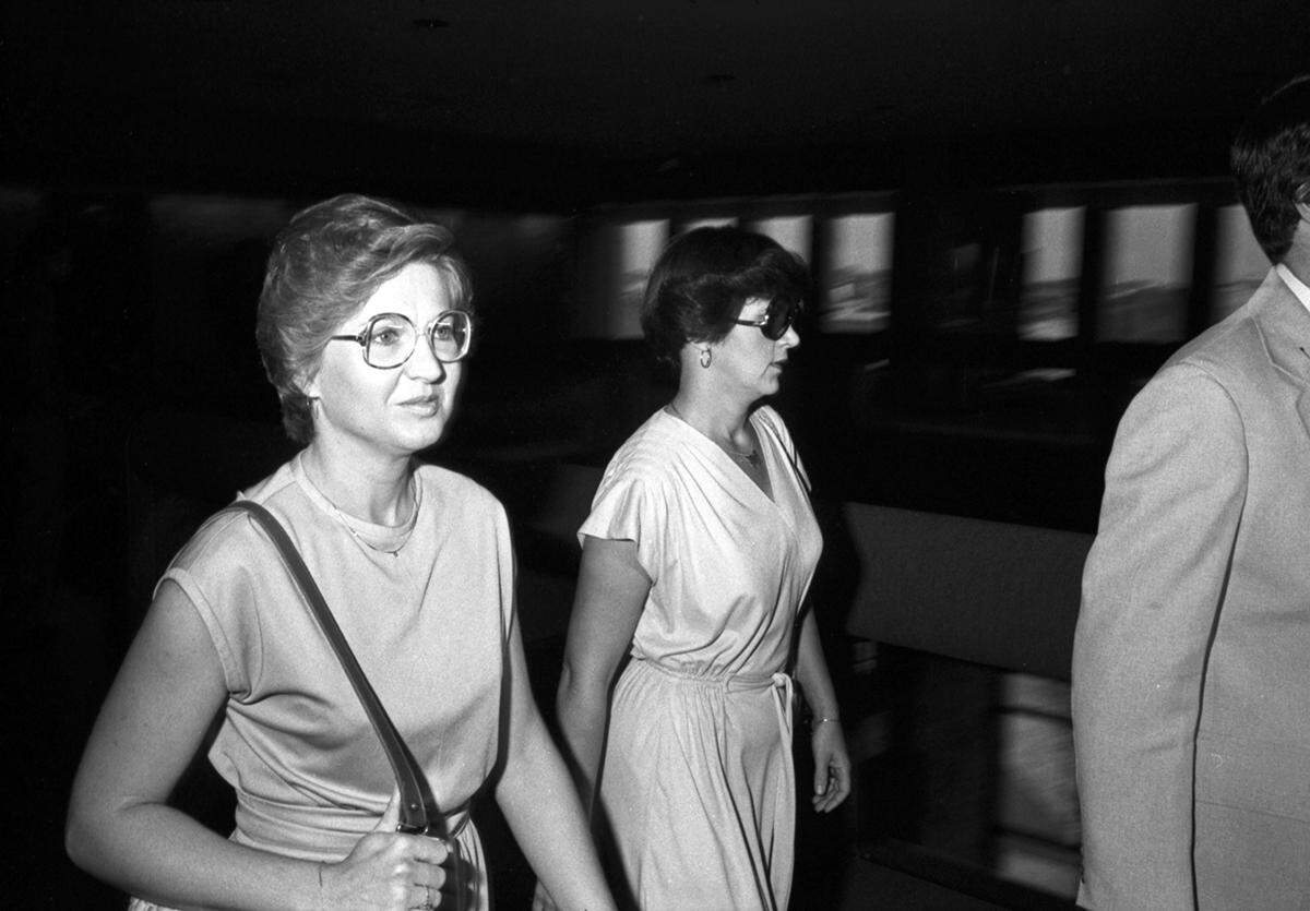 Candace (Candy) Montgomery, left, with unidentified woman, on their way to court for a hearing on Montgomery's trial date.