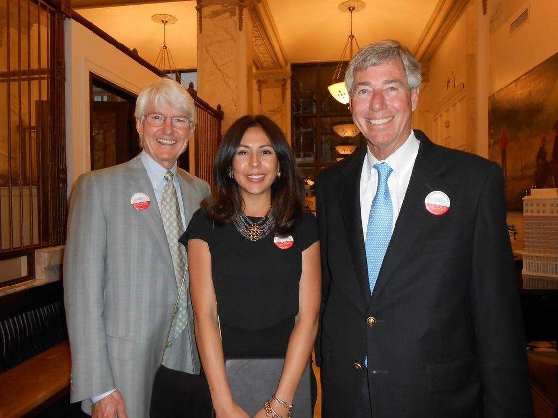Bill Meadows (right) poses for a snapshot with Ed Bass and Sasha Camacho, now Sasha Bass, during a 2019 party at the Worthington Hotel in Fort Worth.