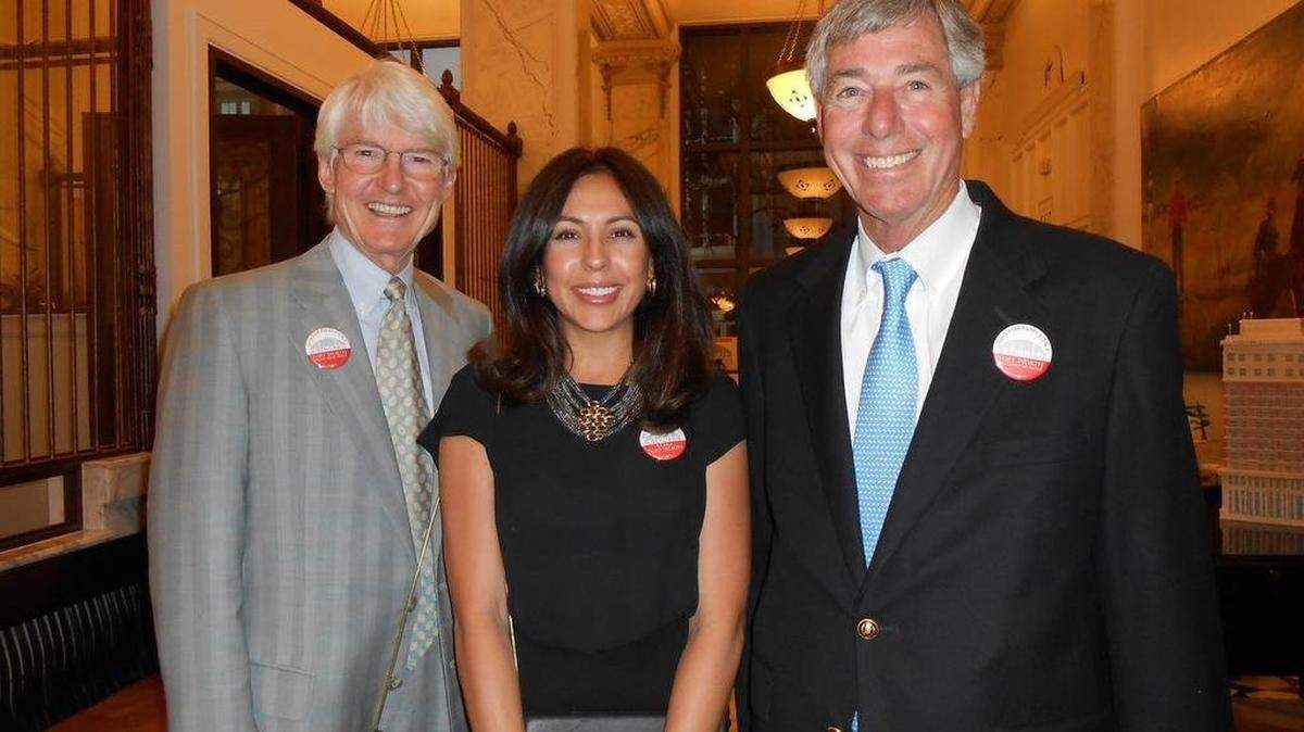 Sasha Bass (center) with husband Ed (left) and DFW Airport board chair Bill Meadows (right) in February 2019. The Basses took over full ownership of Sundance Square in November 2019.