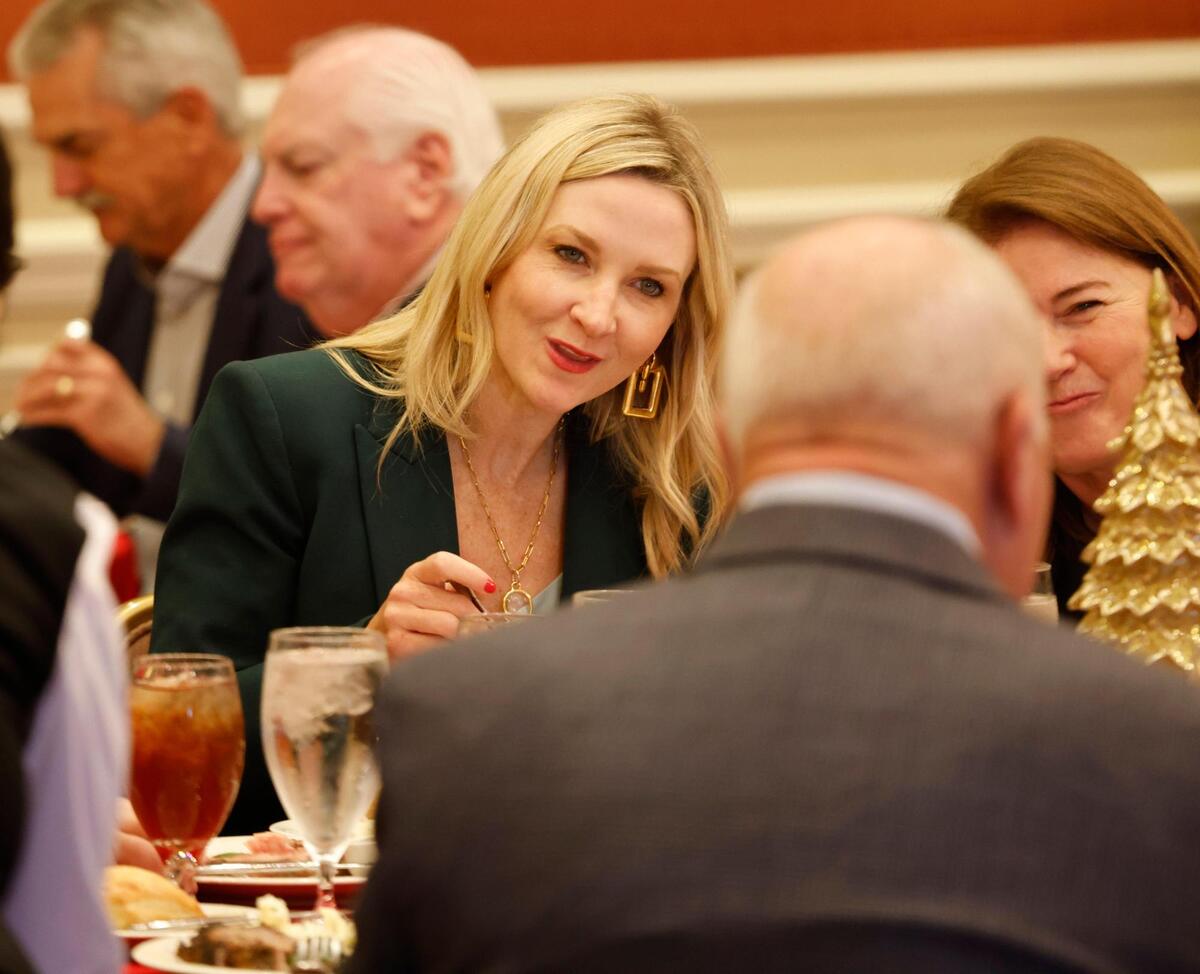Fort Worth mayor Mattie Parker talks with members at her table during the Exchange Club annual Christmas fundraiser at the Fort Worth Club in Fort Worth, Texas, Wednesday, Dec. 4, 2024.