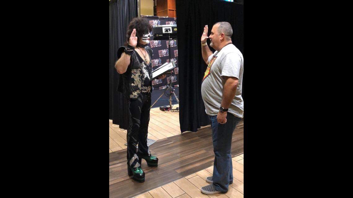KISS drummer Eric Singer was sworn in as a honorary police officer before a concert Monday in Houston, Texas. Photo by Wharton Police Department.
