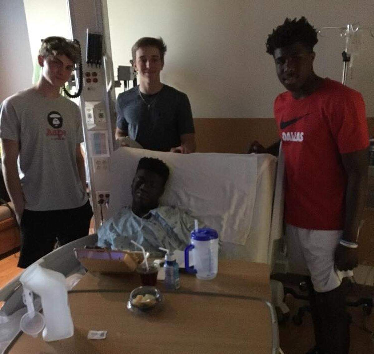 Arlington Lamar’s Brett Green is recovering at JPS Trauma Center. He was visited by some players from Southlake Carroll including QB Will Bowers (middle) and DB R.J. Mickens (right).