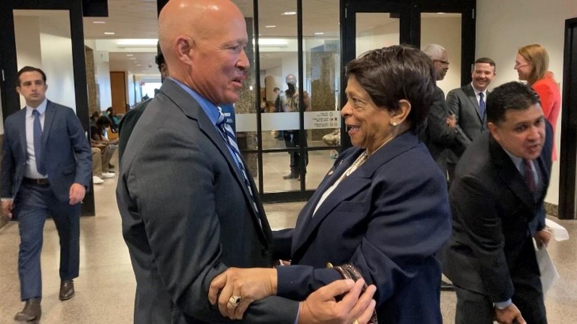 Mallory Nicholson, left, embraces his wife, Ethel Nicholson, after his exoneration for two charges of aggravated sexual assault of a child. He was wrongfully convicted in 1982, according to the Dallas County District Attorney’s Office.