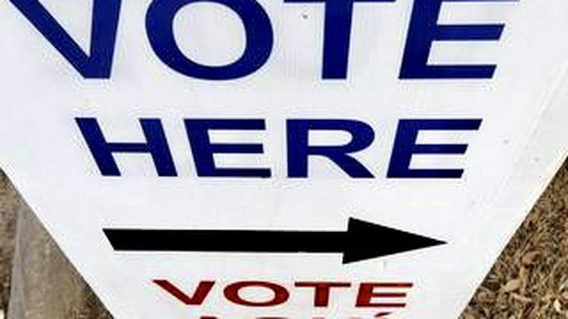 A sign offers directions to a voting location in the Lake Como neighborhood of Fort Worth.