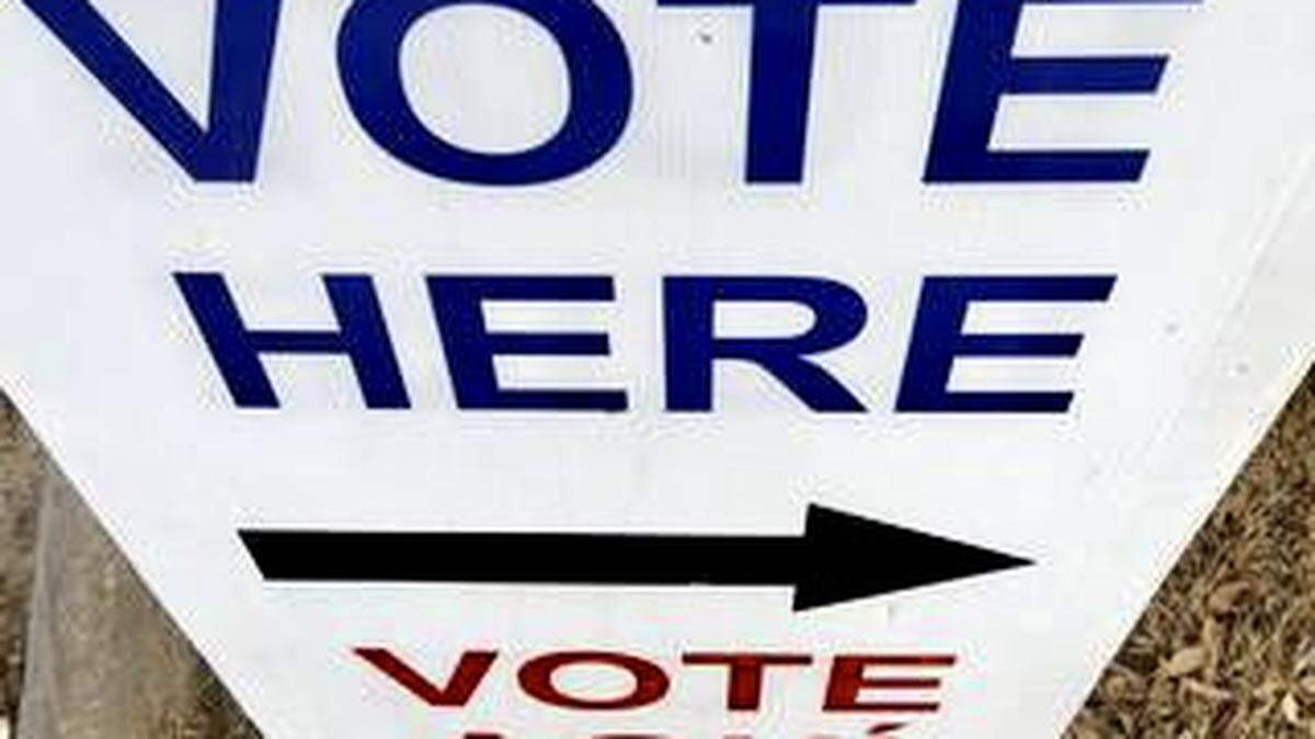 A sign offers directions to a voting location in the Lake Como neighborhood of Fort Worth.