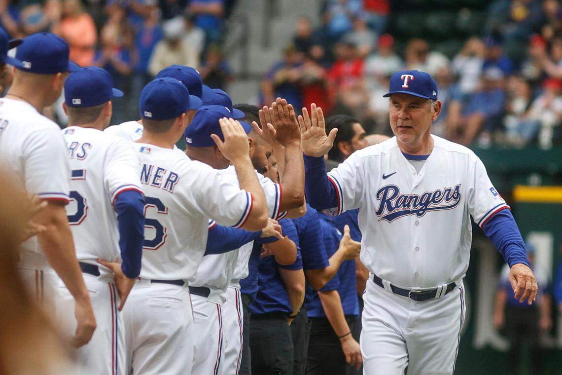 Texas Rangers manager Bruce Bochy takes the field to kick off their 2023 season against the Philadelphia Phillies on Thursday, March 30, 2023.